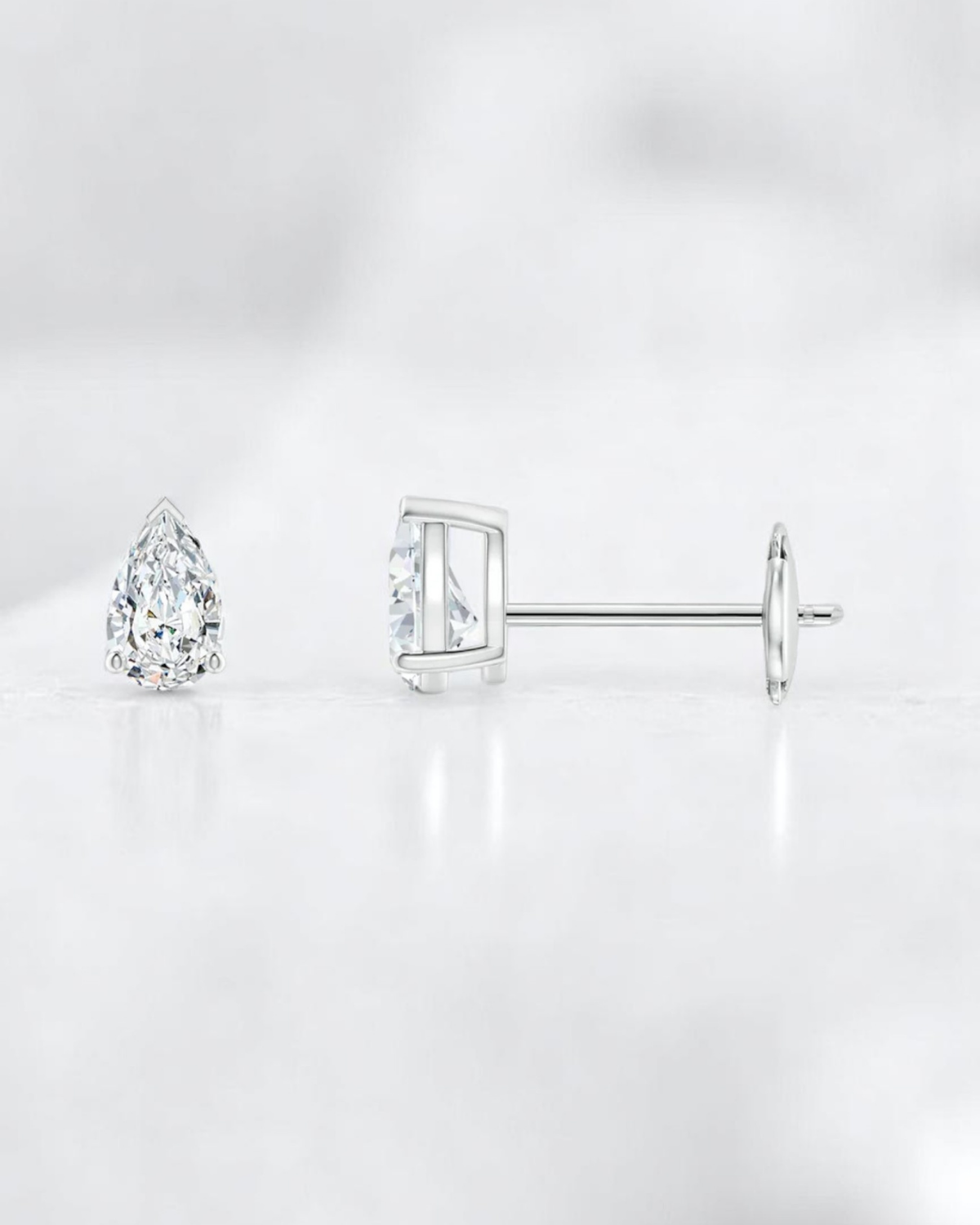 3 Prong Pear Solitaire Stud Earrings