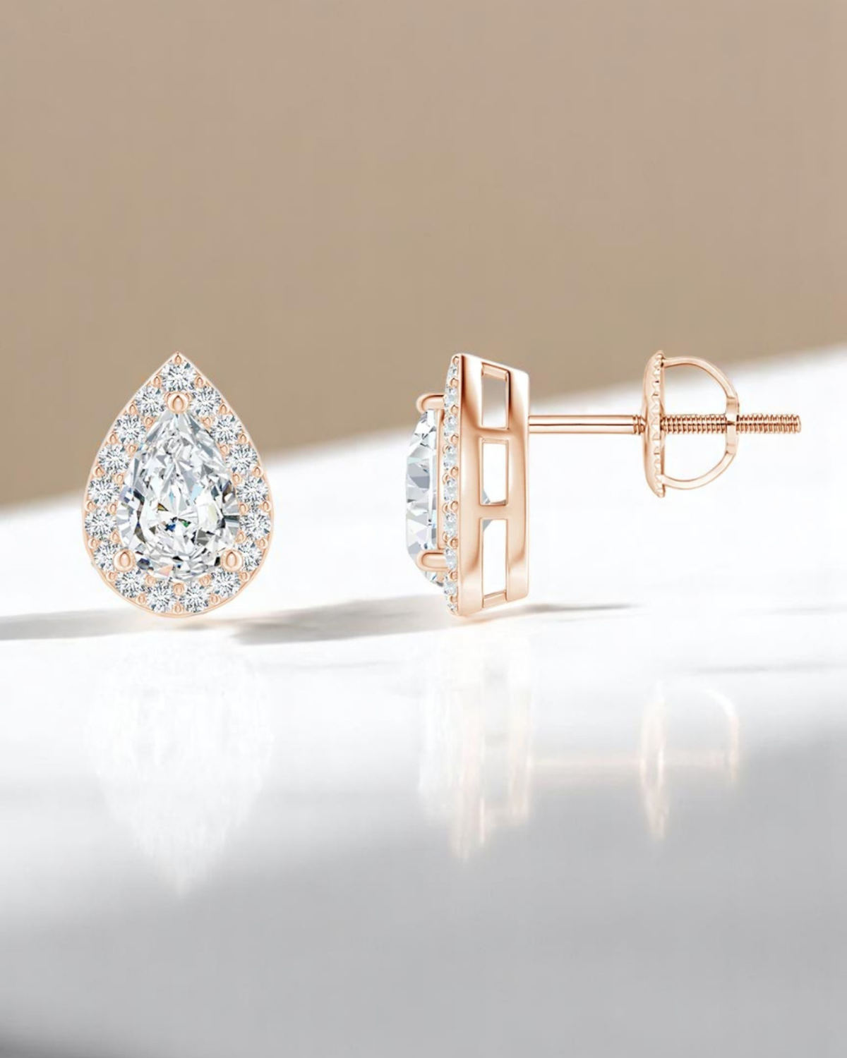 Pear Halo Solitaire Stud Earrings