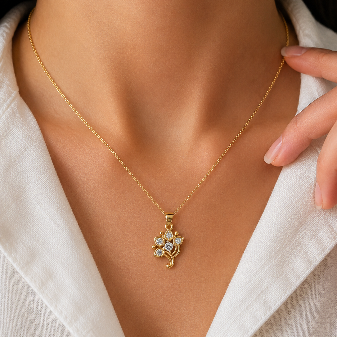 Elevate your everyday style with our Floral Diamond Pendant, crafted in BIS Hallmarked 18Karat, 14Karat & 9Karat Gold. Featuring a delicate flower-inspired design adorned with Certified Real Lab Grown Diamonds & Natural Diamonds, this elegant gold pendant is perfect for daily wear, special occasions, and thoughtful gifting. Shop online at Tathyaa.