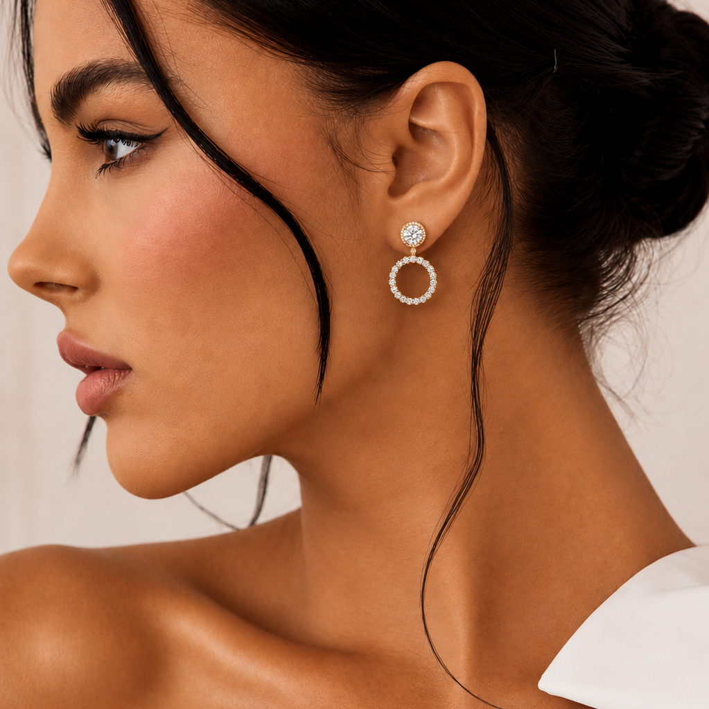Experience the best of both worlds with our Detachable Halo Solitaire Stud Earrings. Expertly engineered for the modern jewelry lover, this exquisite pair serves as a 2-in-1 jewelry investment. Wear them as minimalist, high-brilliance solitaire diamond studs during the day, then effortlessly attach the shimmering diamond halo jackets to transform them into a dramatic, head-turning statement piece for evening wear.