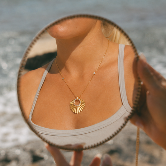 Radiant Sunburst Diamond Pendant in Gold and Silver