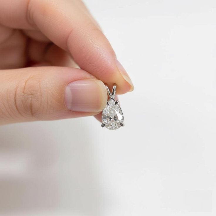 Timeless Pear-Cut Diamond Pendant and Earring Set