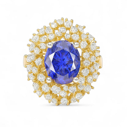 Oval Blue Gemstone and Diamond Halo Ring