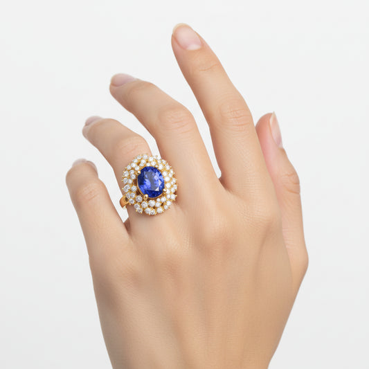 Oval Blue Gemstone and Diamond Halo Ring