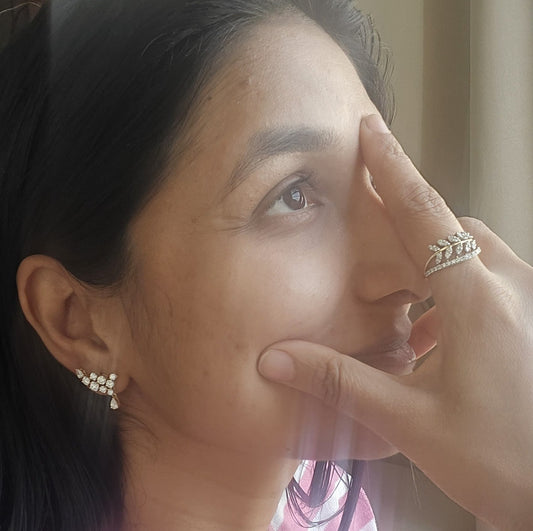 Discover the elegance of the Cascading Pear & Round Diamond Ear Climbers (Model ER2063). Featuring a stunning cluster of 16 round diamonds and 4 pear-cut diamonds set in premium 14kt or 18kt gold, these ear climbers are designed to perfectly accent the curve of your ear. Whether you are dressing for a gala or looking to add a touch of luxury to your ensemble, these unique earrings offer unmatched brilliance and modern sophistication. Explore the artistry behind this exquisite design and elevate your jewelry