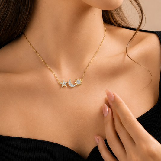 Discover the exquisite design of the celestial pendant, featuring a star, moon, and sun motif set with 35 sparkling diamonds. Crafted in 14K or 18K gold, this versatile charm is perfect for layering. View full dimensions and technical specifications in PD6222.jpeg. Elevate your collection with this radiant, masterfully crafted piece.