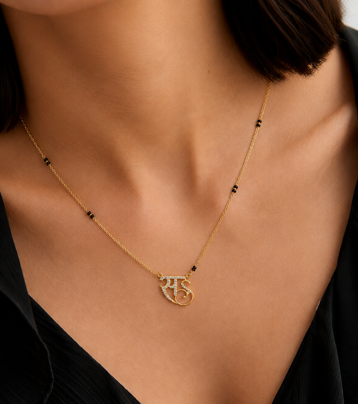The SS Monogram Diamond Pendant