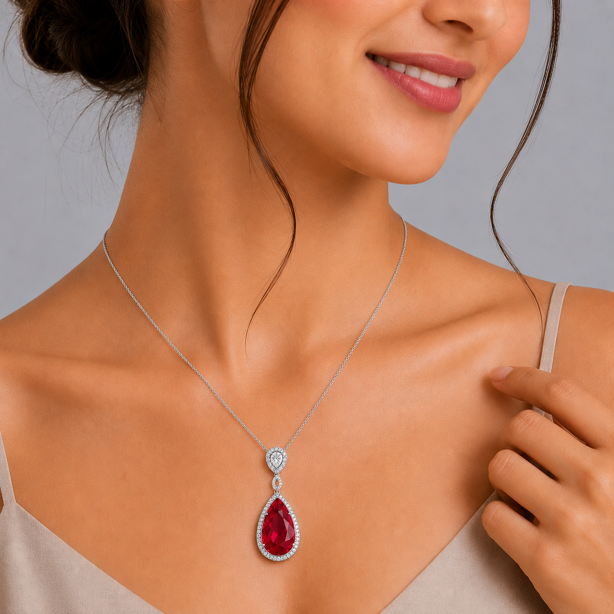 Regal Ruby Drop Pendant with Diamond Halo