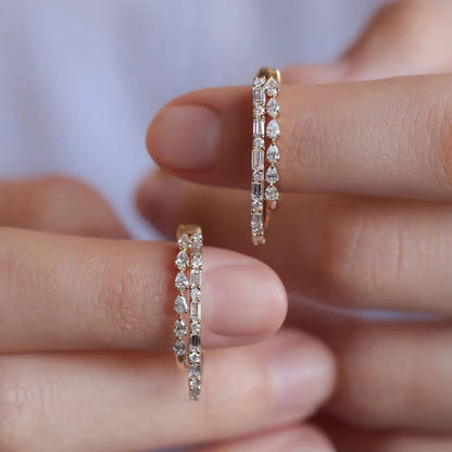 Elevate your look with these elegant double-row diamond hoop earrings. Featuring 36 brilliant diamonds set in premium 14K or 18K gold, these modern huggies are perfect for daily wear or sophisticated occasions. Shop fine handcrafted diamond jewellery online.