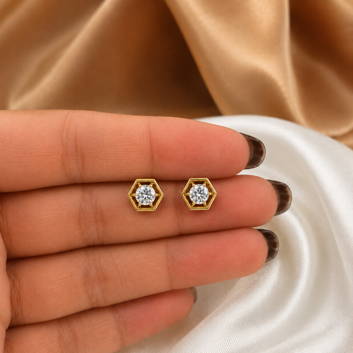 Geometric Hexagon Diamond Stud Settings. Featuring a bold, architectural frame designed to secure 5.10mm round diamonds, these settings are the perfect choice for custom modern stud earrings. Available in premium 18K or 14K gold, these pieces offer a sleek, professional aesthetic suitable for daily wear or sophisticated evening looks.