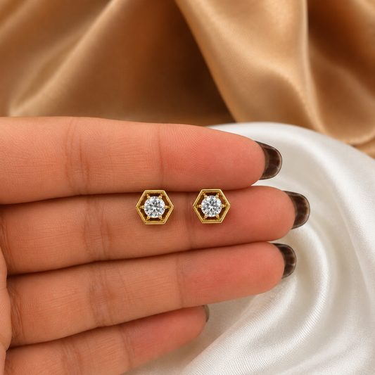 Geometric Hexagon Diamond Stud Settings. Featuring a bold, architectural frame designed to secure 5.10mm round diamonds, these settings are the perfect choice for custom modern stud earrings. Available in premium 18K or 14K gold, these pieces offer a sleek, professional aesthetic suitable for daily wear or sophisticated evening looks.
