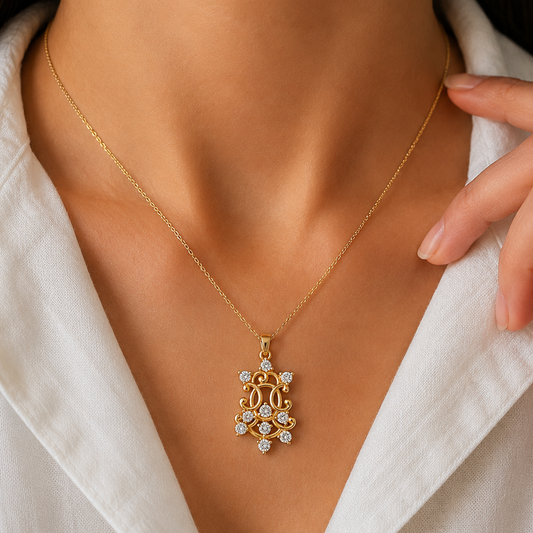 Discover our elegant gold diamond pendant. Featuring 10 brilliant-cut diamonds in an intricate, handcrafted design. Available in 18K & 14K BIS Hallmarked gold. Shop online.