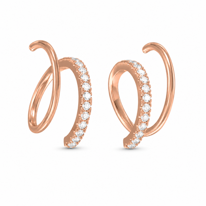 Shop the modern spiral diamond hoop earrings, a stunning 14K or 18K rose gold design featuring 28 brilliant-cut diamonds. Perfect for contemporary style, bridal wear, or sophisticated gifts.  Discover timeless, high-quality gold jewellery today.