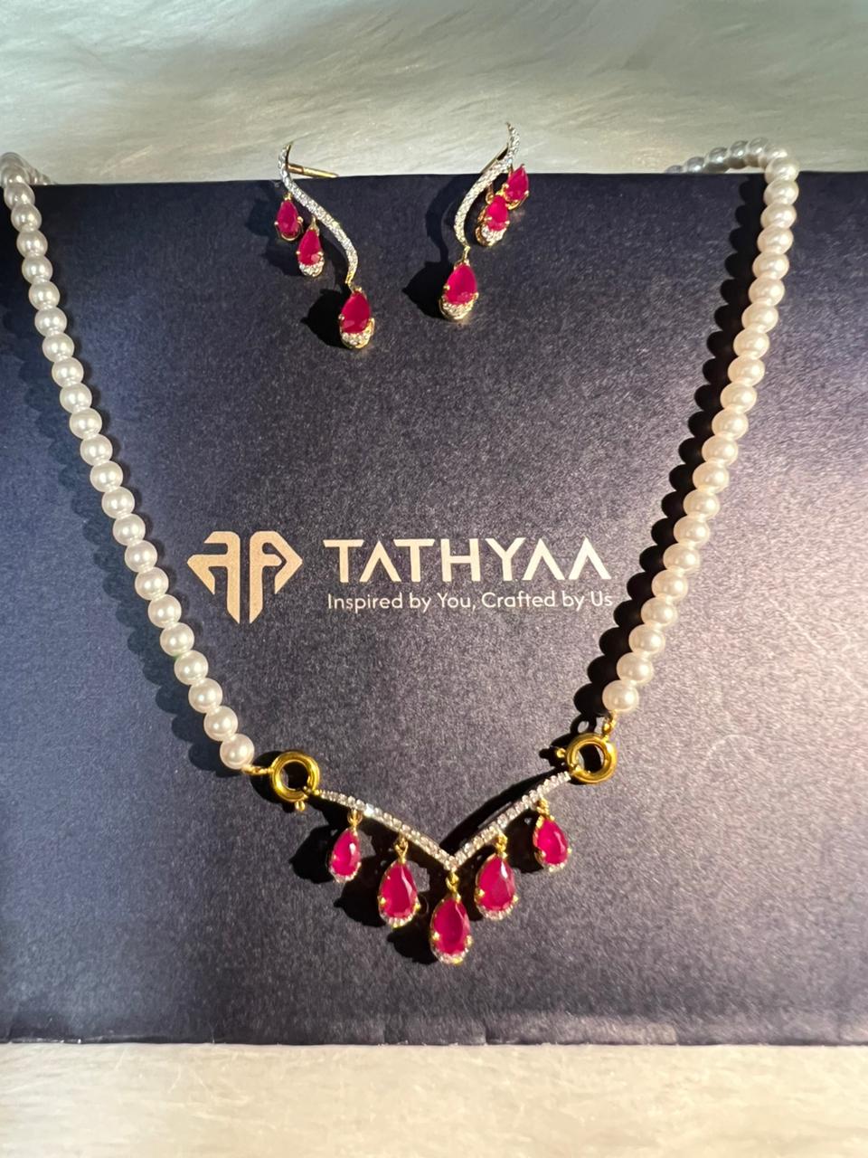Pear Cascade Mangalsutra Set, featuring 90 diamonds and 11 pear-cut stones set in 14K or 18K gold. This luxurious, artisan-crafted bridal set beautifully blends timeless tradition with a modern, graceful design.