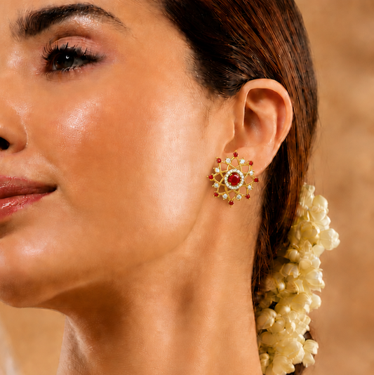 Elevate your style with The Eternal Blossom Stud Earrings (Model PD3181ER). These elegant designs feature a brilliant central stone framed by a unique, petal-inspired gold structure. Available in 14kt or 18kt gold, these earrings offer a perfect balance of lasting beauty and sophisticated craftsmanship. Discover why these studs are a favorite for those seeking a unique, wearable work of art. Add The Eternal Blossom earrings to your collection today.