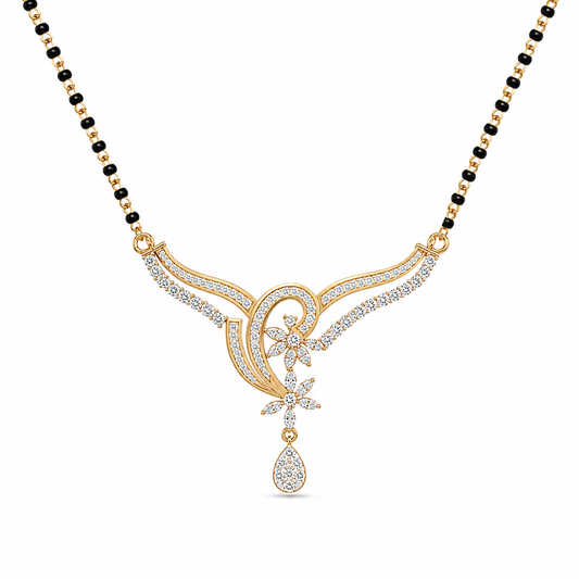 Grace your neckline with The Floral Swirl Heritage Diamond Mangalsutra Pendant, featuring an ornate 43mm wide design set with 74 brilliant diamonds. Available in 14K or 18K gold, this artisan-crafted piece is a breathtaking symbol of bridal grace and timeless elegance. 
