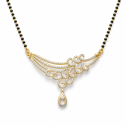 Discover The Heritage Swirl Gala Diamond Mangalsutra Pendant, featuring 219 diamonds in an ornate, 55mm wide swirling design. Available in 14K or 18K gold, this artisan-crafted piece is the perfect choice for weddings and grand festive celebrations. 