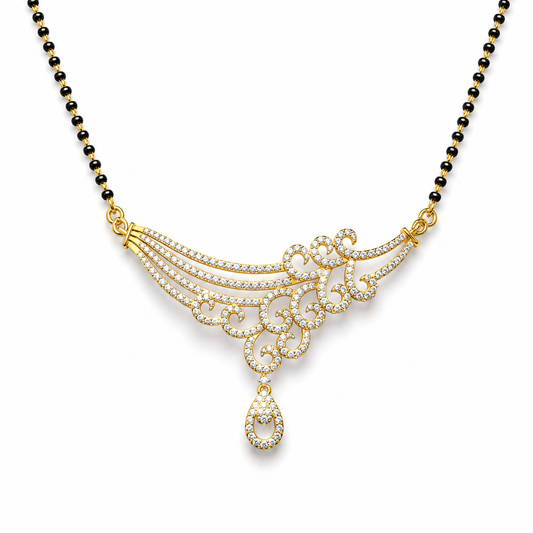 Discover The Heritage Swirl Gala Diamond Mangalsutra Pendant, featuring 219 diamonds in an ornate, 55mm wide swirling design. Available in 14K or 18K gold, this artisan-crafted piece is the perfect choice for weddings and grand festive celebrations. 