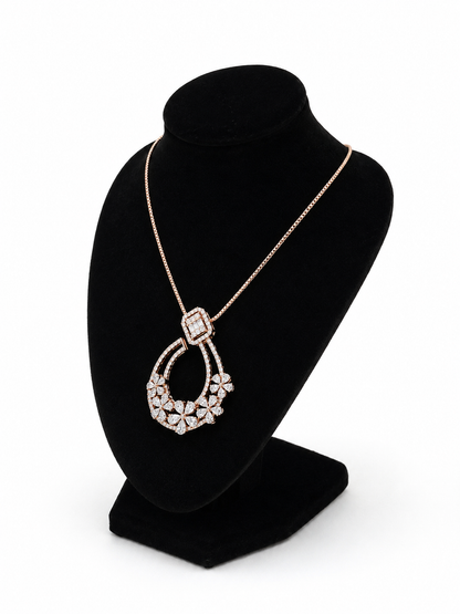 Discover The Royal Bloom Architectural Diamond Statement Pendant, featuring 87 diamonds in a breathtaking floral and curved design. Available in 14K or 18K gold, this artisan-crafted piece is the ultimate jewel for weddings, festive occasions, and grand celebrations. 