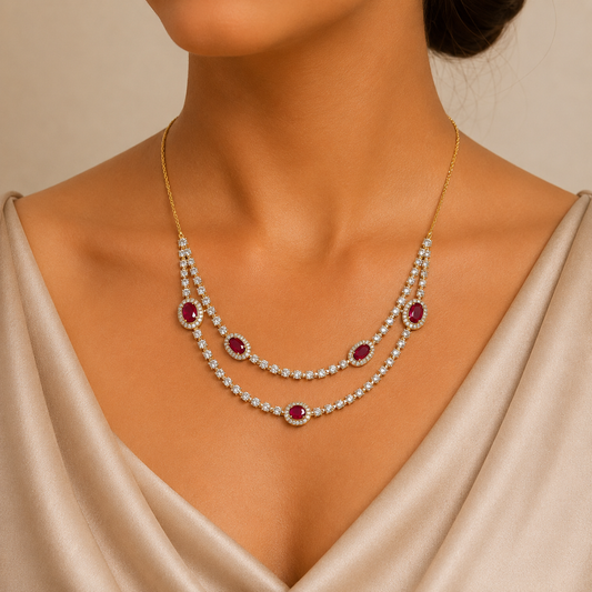 Elevate your bridal look with The Royal Crimson Double-Layer Diamond & Ruby Necklace. Featuring 166 brilliant diamonds and rich, oval-cut rubies set in BIS-hallmarked 14K or 18K gold, this statement piece is the ultimate symbol of luxury. It is designed for those who appreciate timeless grace.