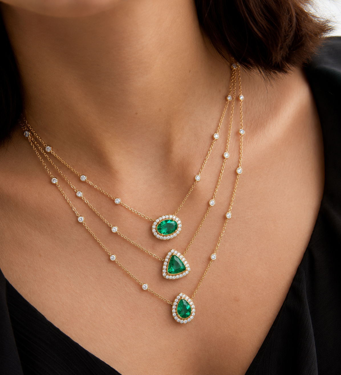 Shop the Tri-Charm Emerald & Diamond Necklace, crafted for timeless elegance in BIS Hallmarked 18K, 14K, or 9K gold. Featuring 75 certified real lab-grown or natural diamonds, this piece is designed for everyday luxury, meaningful gifting, and those who seek distinctive, artisan-made fine jewelry. 