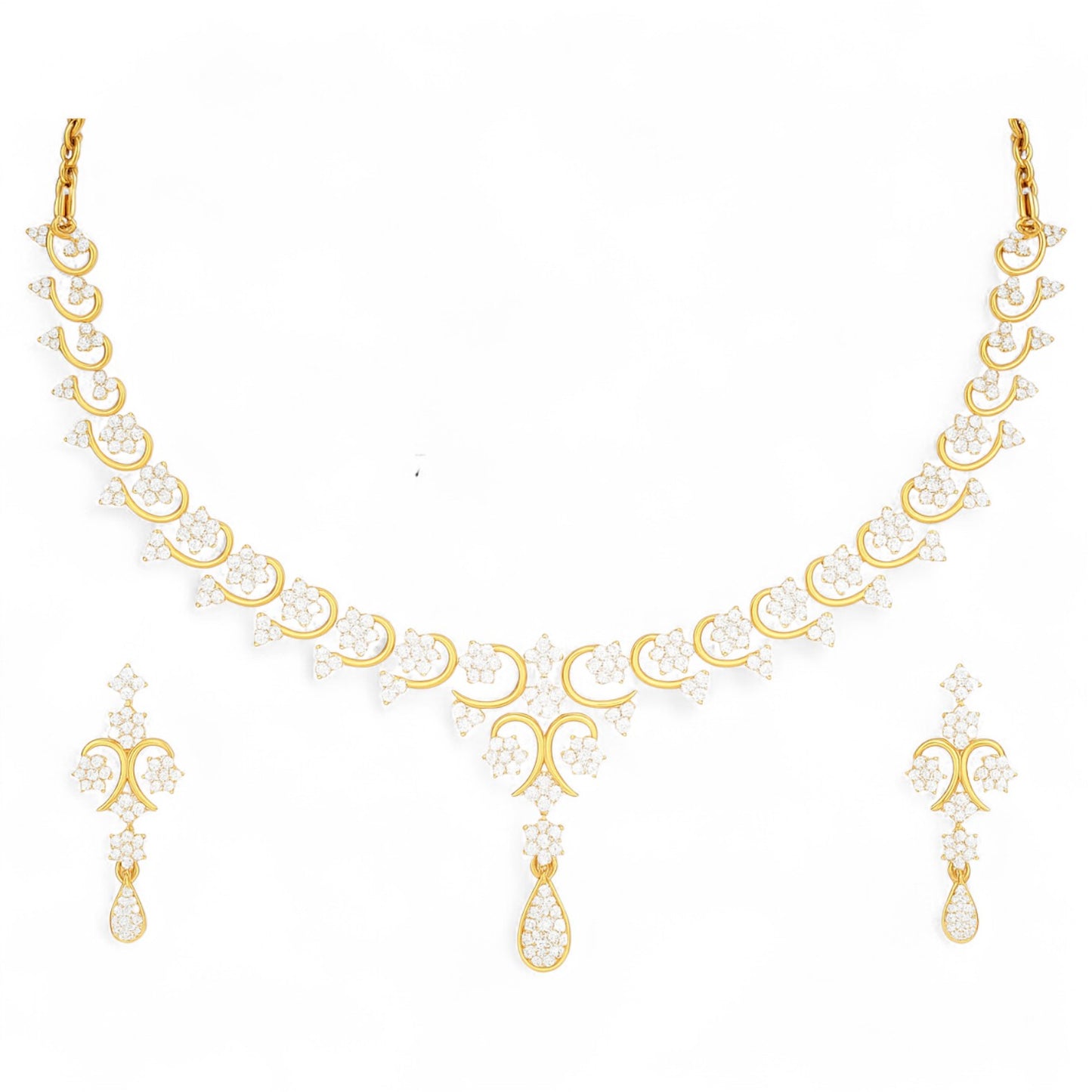 Yellow gold necklace and matching drop earrings set featuring delicate floral diamond clusters and a teardrop pendant.