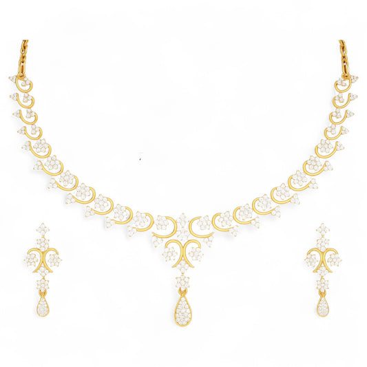 Yellow gold necklace and matching drop earrings set featuring delicate floral diamond clusters and a teardrop pendant.