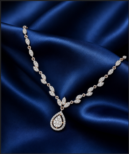 Elegant rose gold necklace featuring a diamond marquise leaf chain and a central halo teardrop pendant. The design radiates a delicate botanical aesthetic perfect for modern fine jewelry wear.